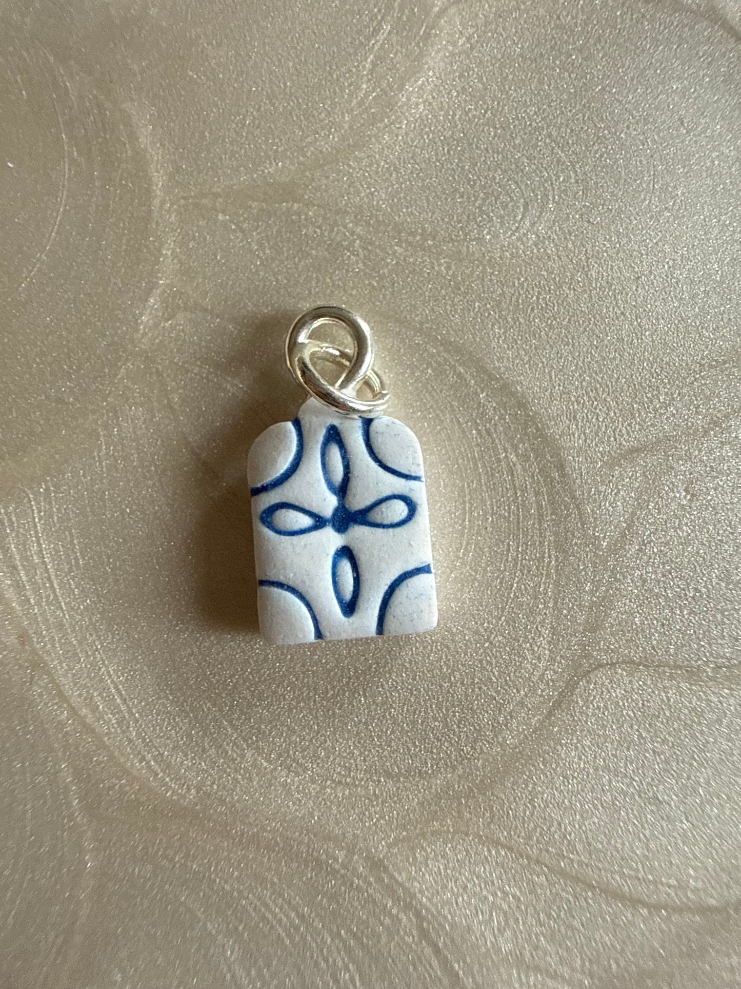 Arch Cross Clay Charm